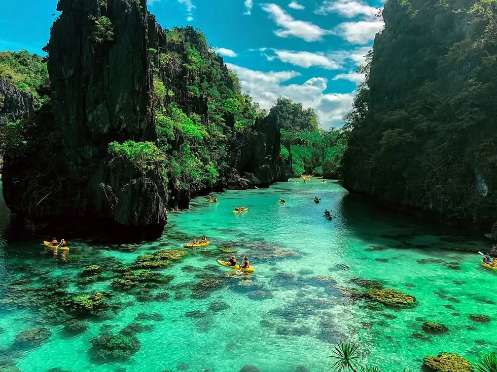 Kayakers paddling into the Big Lagoon in El Nido, Palawan